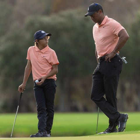 Tiger and Charlie Woods shot 10-under 62 in the fi