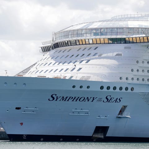 The Symphony of the Seas cruise ship is shown dock