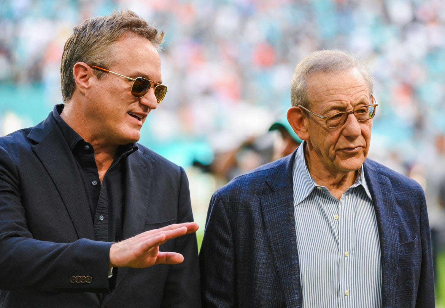 Miami Dolphins President Tom Garfinkel speaks with team owner Steve Ross after the end of the NFL game against the New York Jets at Hard Rock Stadium in Miami Gardens, FL, on December 19, 2021. Final score, Miami Dolphins 31, New York Jets, 24.