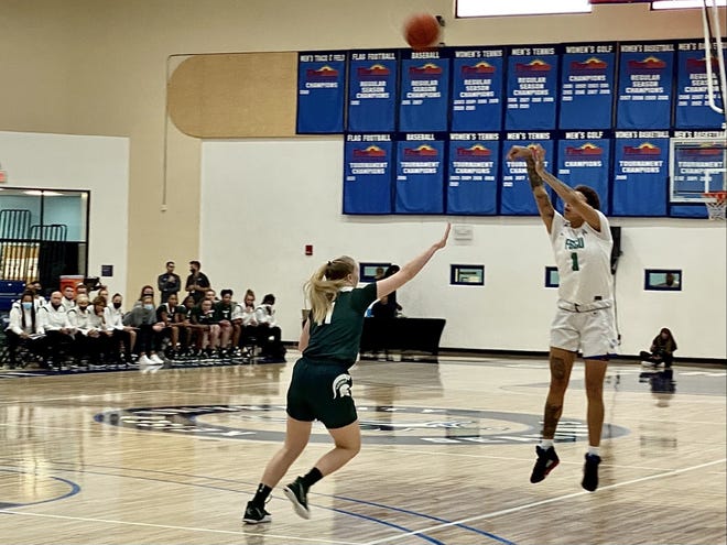 FGCU's Kierstan Bell shoots against Michigan State in a game in West Palm Beach on Dec. 20, 2021.