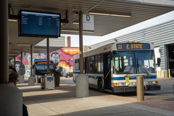 RMTD buses waiting for riders at the downtown terminal before departing on Monday, December 20, 2021 in Rockford.