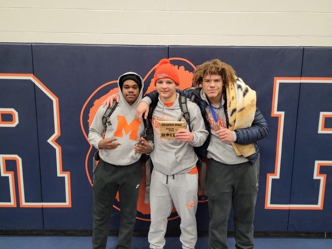 Mansfield Senior's Leo Hess (middle) took home first place at the Galion Wrestling Invitational in his 175-pound weight class going 5-0 on the day while Mekhi Bradley (right) went 4-1 and took third at 285 and Zyion Brown (left) took sixth at 150.