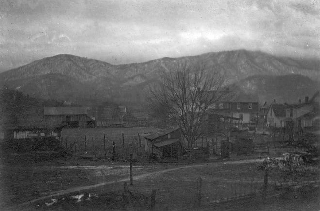 This photograph from the Swannanoa Valley Museum captures a winter view of the east side of Black Mountain Avenue looking south from behind the train depot.