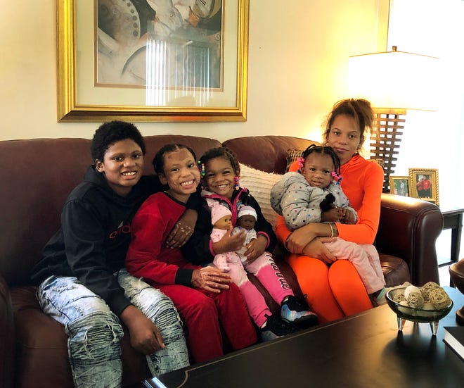 Demika Pinson, far right with her children from left, Darius Wheeler, Delilah Wheeler, Di’yoir Wheeler, and Patience Wheeler.