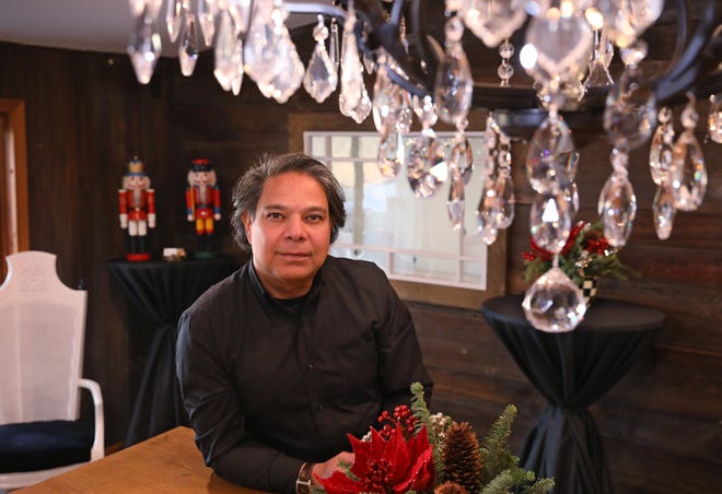 Jorge Cazzorla at work in his Jorge Cazzorla Elegant Designs shop in Pittsford Tuesday, Dec. 21, 2021. The business specializes in weddings, events and floral designs. 