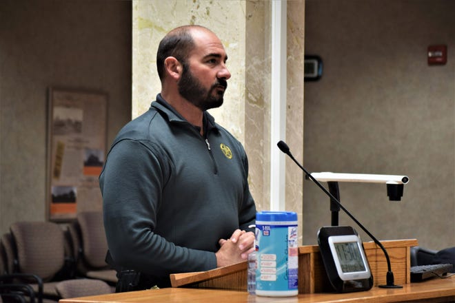 Minnehaha County Jail Warden Mike Mattson briefs the commission on the medication assistant treatment (MAT) program agreements at a meeting Tuesday, December 21, 2021.