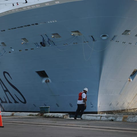 A dock worker waits for the Royal Caribbean's Odys