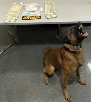 The Guernsey County Sheriff's Office will continue to battle the trafficking, possession and distribution of illegal drugs such as the ones seen here in 2022. It is one of the top priorities for Sheriff Jeff Paden. The suspected fentanyl and methamphetamines pictured here were located with the assistance of Sheriff's K-9 Hoke, also pictured, during a drug bust in December that resulted in felony charges against residents of Akron and Parkersburg, West Virginia.