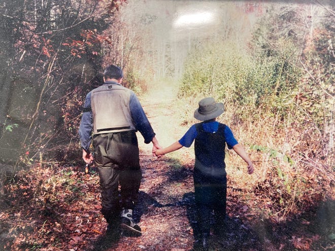 One of his favorite photographs, this shows Dr. James Radford and his son, when he was a boy, on a fishing trip. Now retired, Radford is looking forward to more fishing and spending time with wife, Heidi, and their tree children.