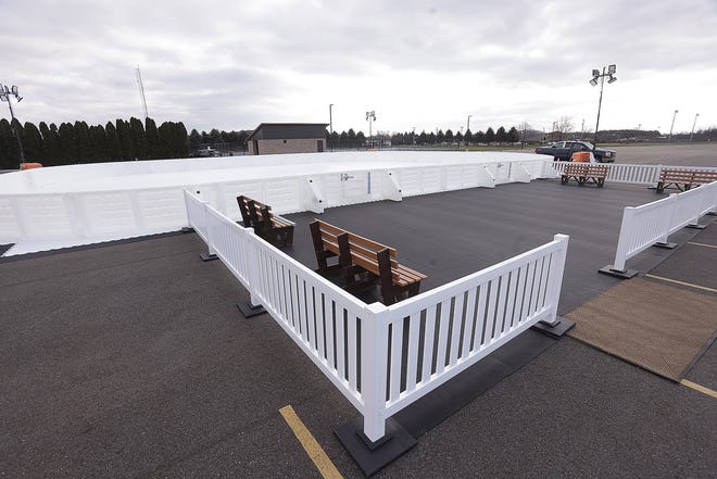 An artificial skating ring is being installed in the parking lot next to the amphitheater at North Park in Jackson Township. The rink will open Monday.