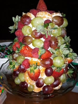 Daughter Loretta made this beautiful fruit tree for the Eicher family Christmas gathering.
