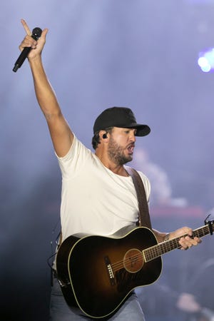 Luke Bryan sang "Huntin', Fishin' and Lovin' Every Day" at his Farm Tour concert on the Kubiak family farm in Conway Township Saturday, Sept. 18, 2021.