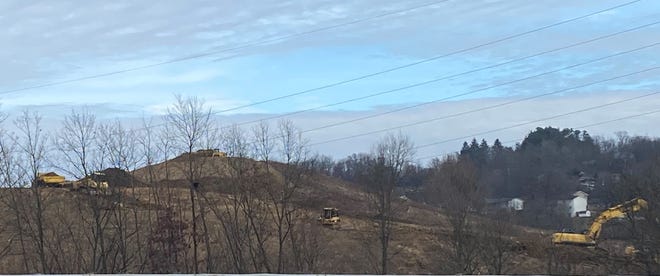 Crews continue to clear the land where an American Electric Power service station will be build in Guernsey County next year. An office building and two storage facilities are part of the estimated $20 million project near the Interstate 77/U.S. 22 interchange east of Cambridge.