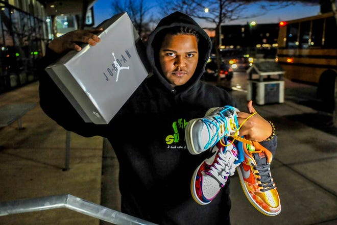 Rodolfo 'Rody' Montilla is a senior at the Providence Career and Technical Academy, a football player at Central High School and is known for his side hustle as a sneaker seller. Montilla paid retail, around $525, - for the three pairs in his left hand - Nike Off-White x Dunk Lot 2 out of 50 (left), Nike Parra X Dunk Low Pro SB Abstract Art (center) and Nike SB Dunk Low 'Street Hawker' (right) - and they hold a value of around $1400 on the secondary market.