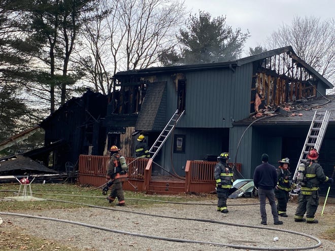 Volunteer firefighters from multiple departments on Thursday battled a blaze that seriously damaged a house along Delaware County Road 300-W in Monroe Township.