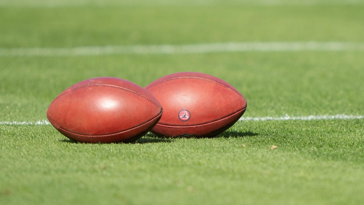 General view of two footballs.