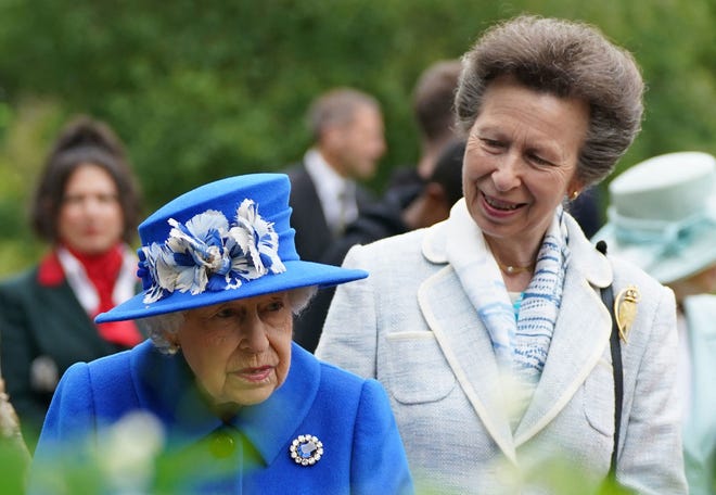 Princess Anne, the Princess Royal, with her mother, Queen Elizabeth II, during a visit to The Children's Wood Project in Glasgow on June 30, 2021, as part of the monarch's traditional trip to Scotland for Holyrood Week.