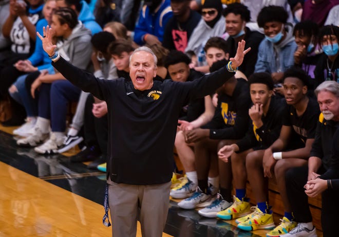 Lincoln Park head boys basketball coach Mike Bairiski yells instructions to his team during the Leopards' game Thursday at Quaker Valley High School.