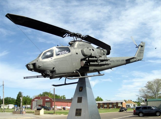 The Vietnam War era Cobra helicopter that welcomes folks to The Post Bar and Grill in Burlington, Colo.