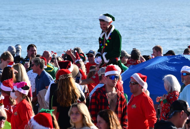 Thousands showed up last year to watch hundreds of Surfing Santas hit the waves in downtown Cocoa Beach at the Christmas Eve Surfing Santas of Cocoa Beach event. It started in 2009 when George Trosset and his son went out surfing in Santa suits on Christmas Eve.