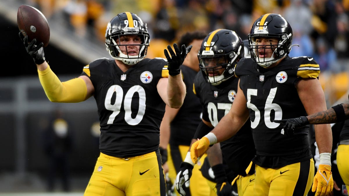 T.J. Watt of the Pittsburgh Steelers celebrates after a fumble recovery in the fourth quarter over the Tennessee Titans at Heinz Field on December 19, 2021 in Pittsburgh, Pennsylvania.