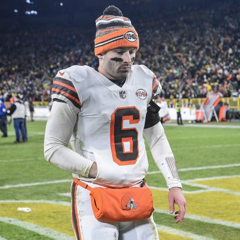 Baker Mayfield walks off the field after the Brown