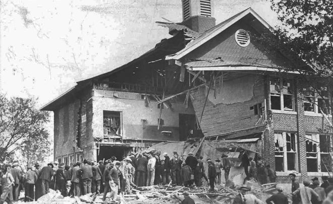 This is the front view of the Bath Township school building, north of Lansing, after it was bombed the morning of May 18, 1927, by Andrew Philip Kehoe, who was born and raised in Tecumseh but later resided in Bath Township. The Bath School Massacre killed 45 and injured 58, making it the deadliest school killing in U. S. history.