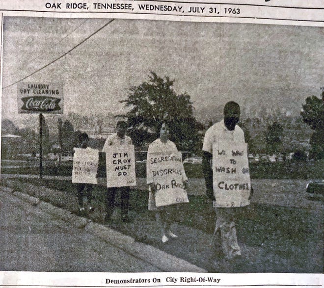 Demonstrators seeking to desegregate the Multi-Matic laundromat are shown in this old copy of The Oak Ridger.