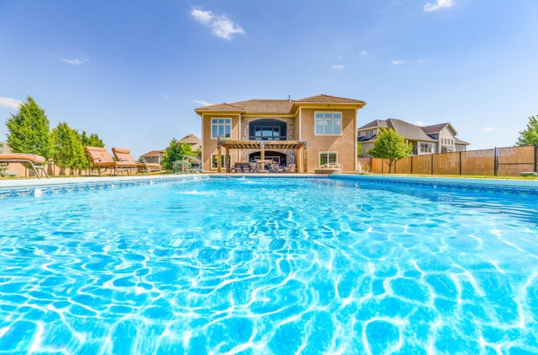 Altoona house for sale includes pool, theater on 3/4 acre