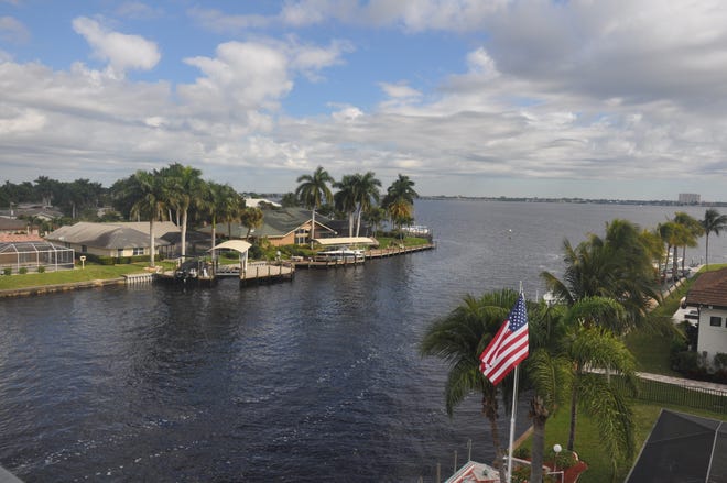 Sweeping views of the canal and the Caloosahatchee can be seen from the third floor terrace.