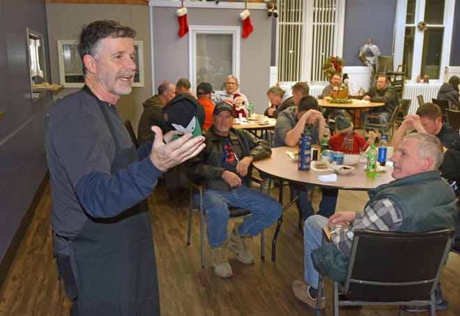 Kevin McKenna of men's ministry DoorKeepers volunteers at Grace Centers of Hope in Pontiac.