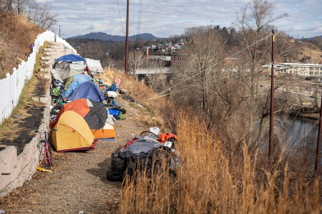 An encampment that was growing along the French Broad River in December. It was cleared by Asheville police Dec. 30, 2021.