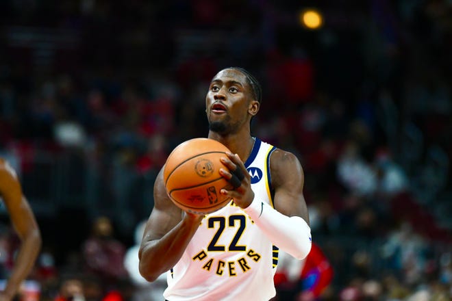 Caris LeVert shoots a free throw as the Pacers face the Bulls at the United Center in Chicago on Dec. 26, 2021.
