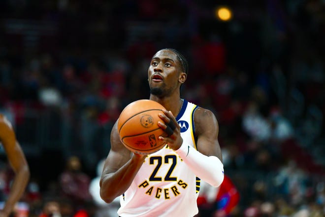 Caris LeVert shoots a free throw as the Pacers face the Bulls at the United Center in Chicago on Dec. 26, 2021.