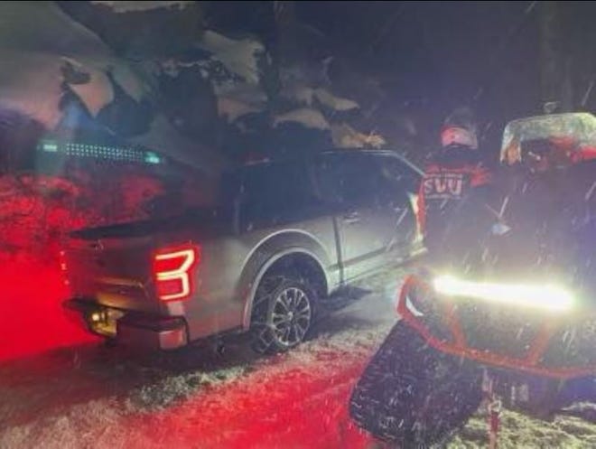 The Washoe County Sheriff's Office search and rescue crew responds to a family that got stuck when they tried to use Dog Valley Road to bypass the closed Interstate 80 on Monday, Dec. 27, 2021. According to WCSO, the family — two adults, a 17-year-old, 15-year-old and 5-year-old — were traveling in a rented pickup truck from Southern California to Truckee to visit family for the holidays. With I-80 closed, they detoured using the two-lane dirt road which is covered in snow. They passed several signs warning drivers not to use the roads but decided to follow their GPS instead.