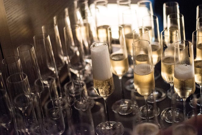 The Atlantic Sands Hotel & Conference Center in Rehoboth Beach will thrust patrons into the New Year with with champagne and more during its end-of-year party on Friday. Pictured are glasses of bubbly from a promotional event in China on June 30, 2017.