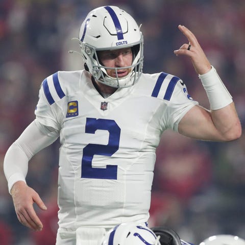 Colts quarterback Carson Wentz signals a play agai