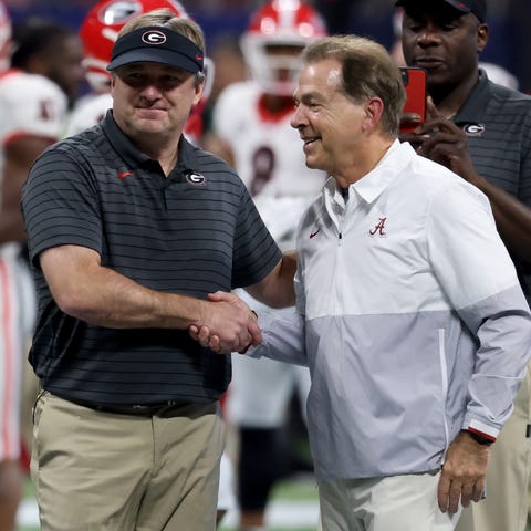 Georgia coach Kirby Smart greets Alabama coach Nic