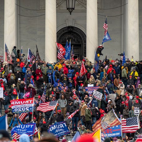 Protesters swarm the U.S. Capitol building as protests in Washington, DC as the U.S. Congress meets to formally ratify Joe Biden as the winner of the 2020 Presidential election on Jan. 6, 2021.