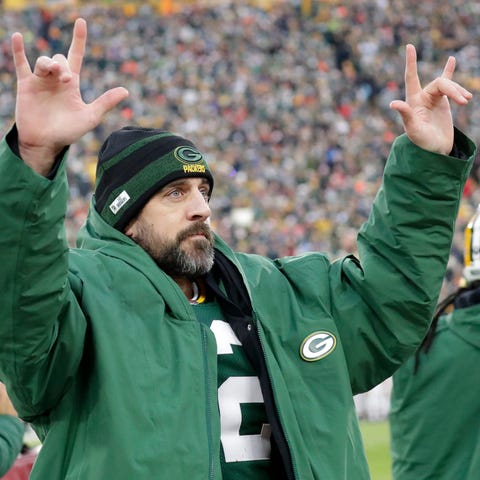Green Bay Packers quarterback Aaron Rodgers (12) a