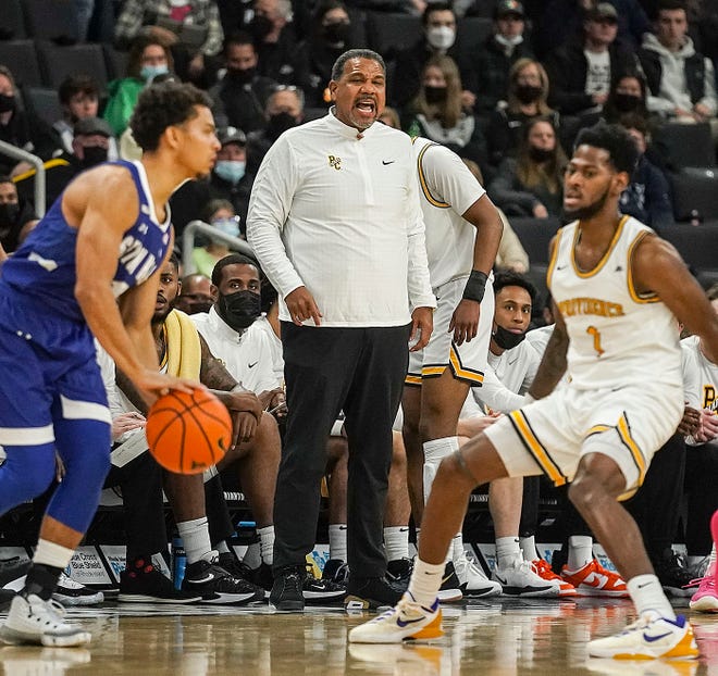 PC head coach Ed Cooley watches as a Seton Hall player brings the ball up the court against the Friars' Al Durham during Wednesday's game.