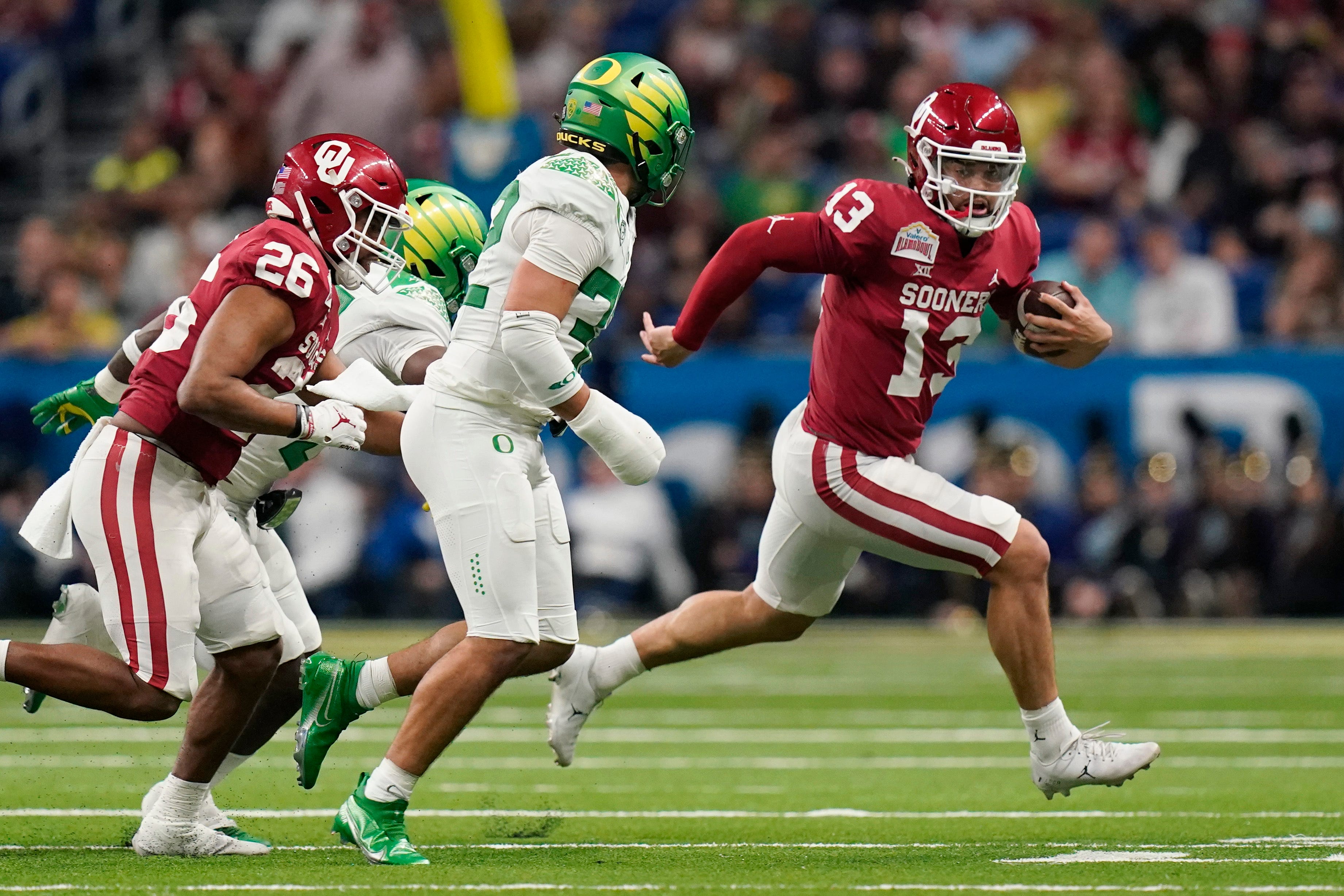 Game balls from Oklahoma's 47-32 win over Oregon in the Alamo Bowl