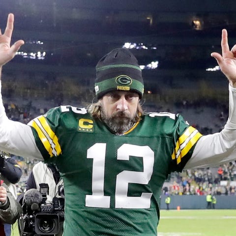 Aaron Rodgers leaves the field after the Green Bay