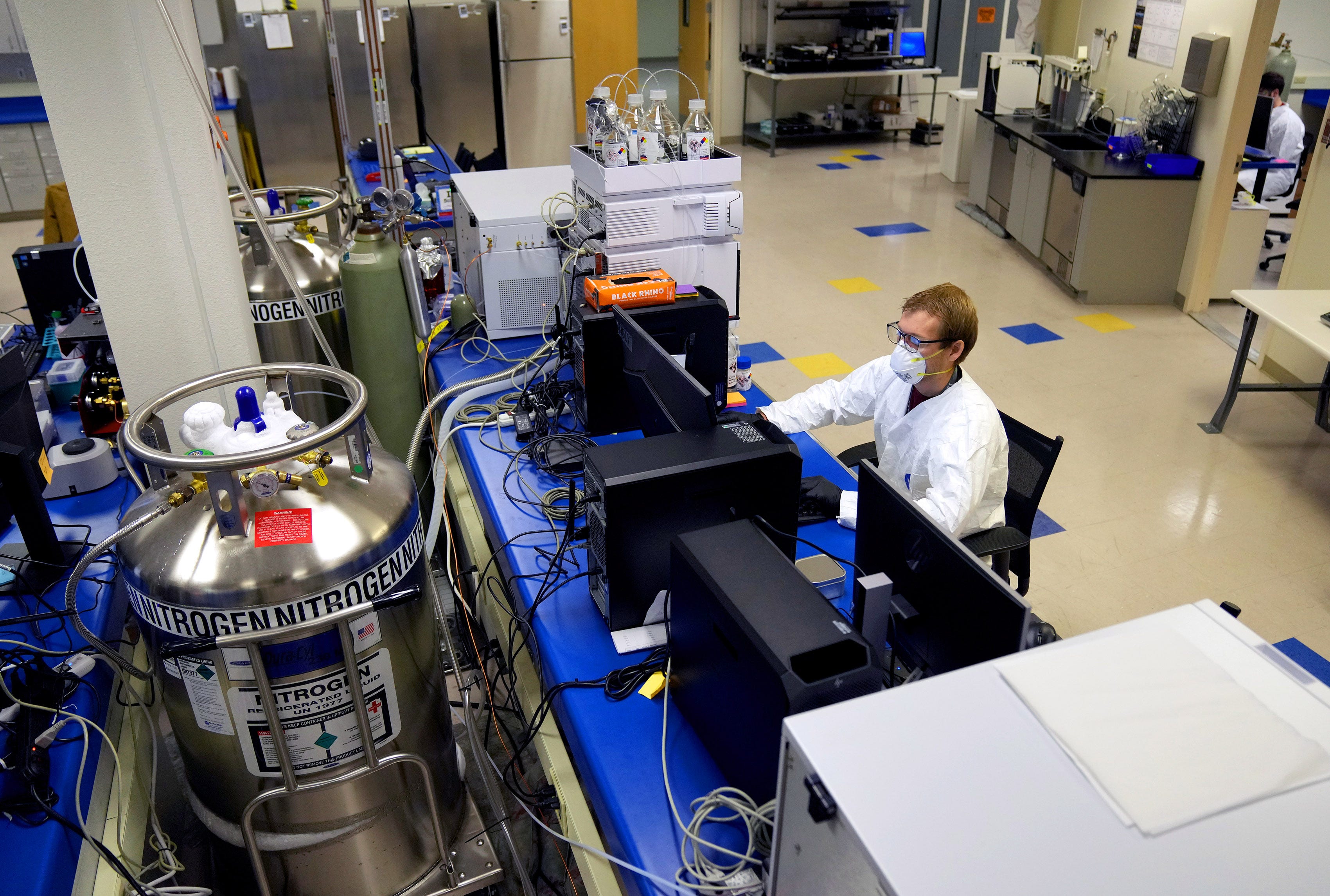 Paul Hanson, lab manager at Apollo Labs in Scottsdale, runs a test on marijuana for pesticides.