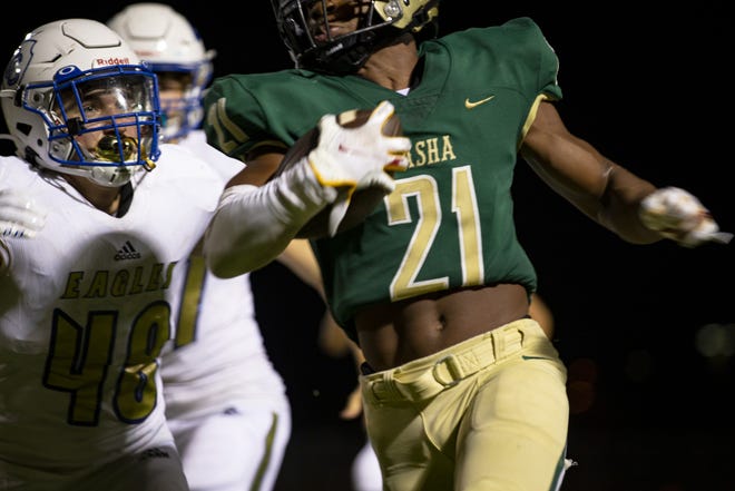 Basha High School cornerback Cole Martin (21) runs with the football during a game against Sandra Day O'Connor on Sept. 3, 2021 at Basha High School in Chandler. Monica D. Spencer/The Republic 5674119001