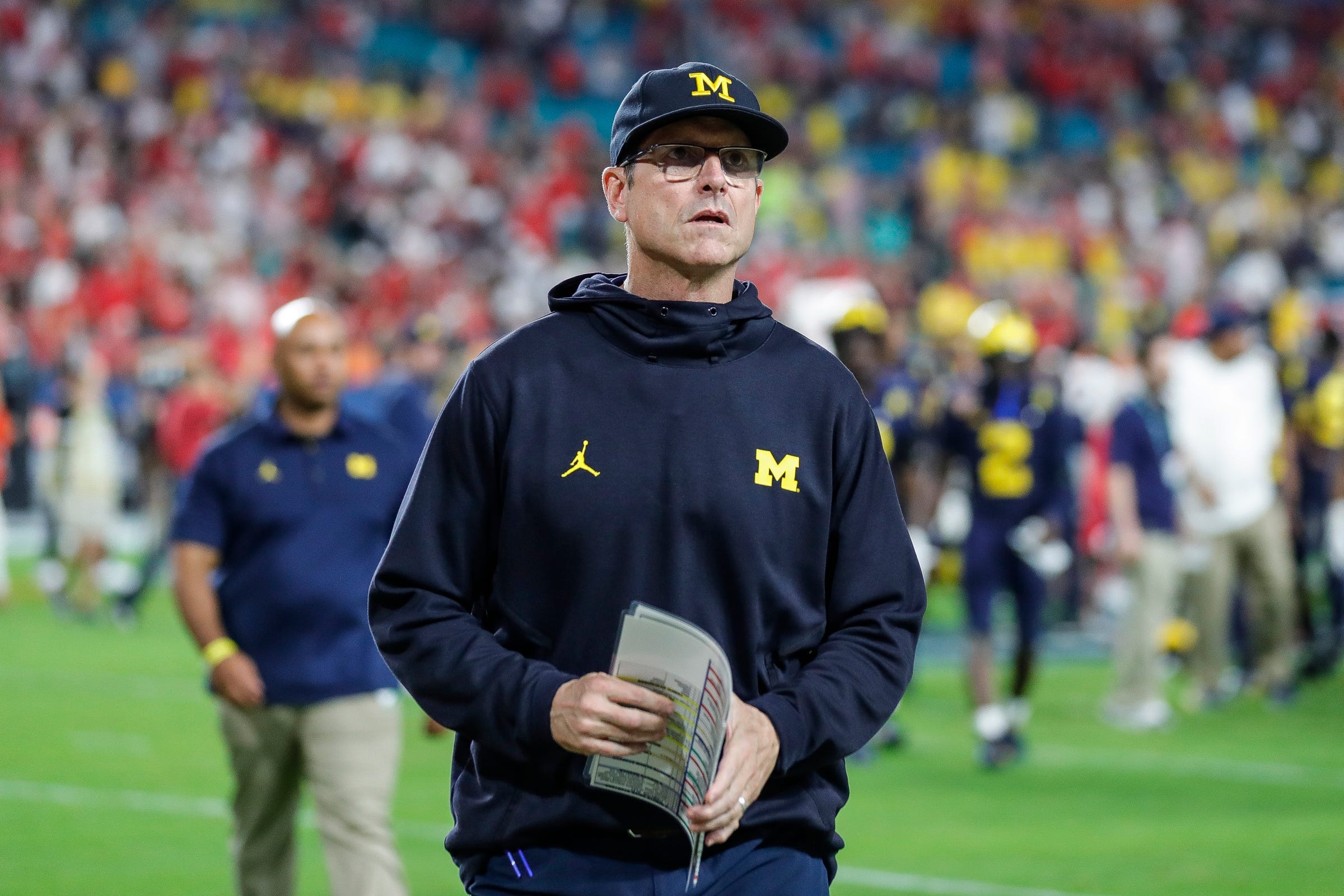 Opinion after. Jim Harbaugh. Sports coach. Sport coach.
