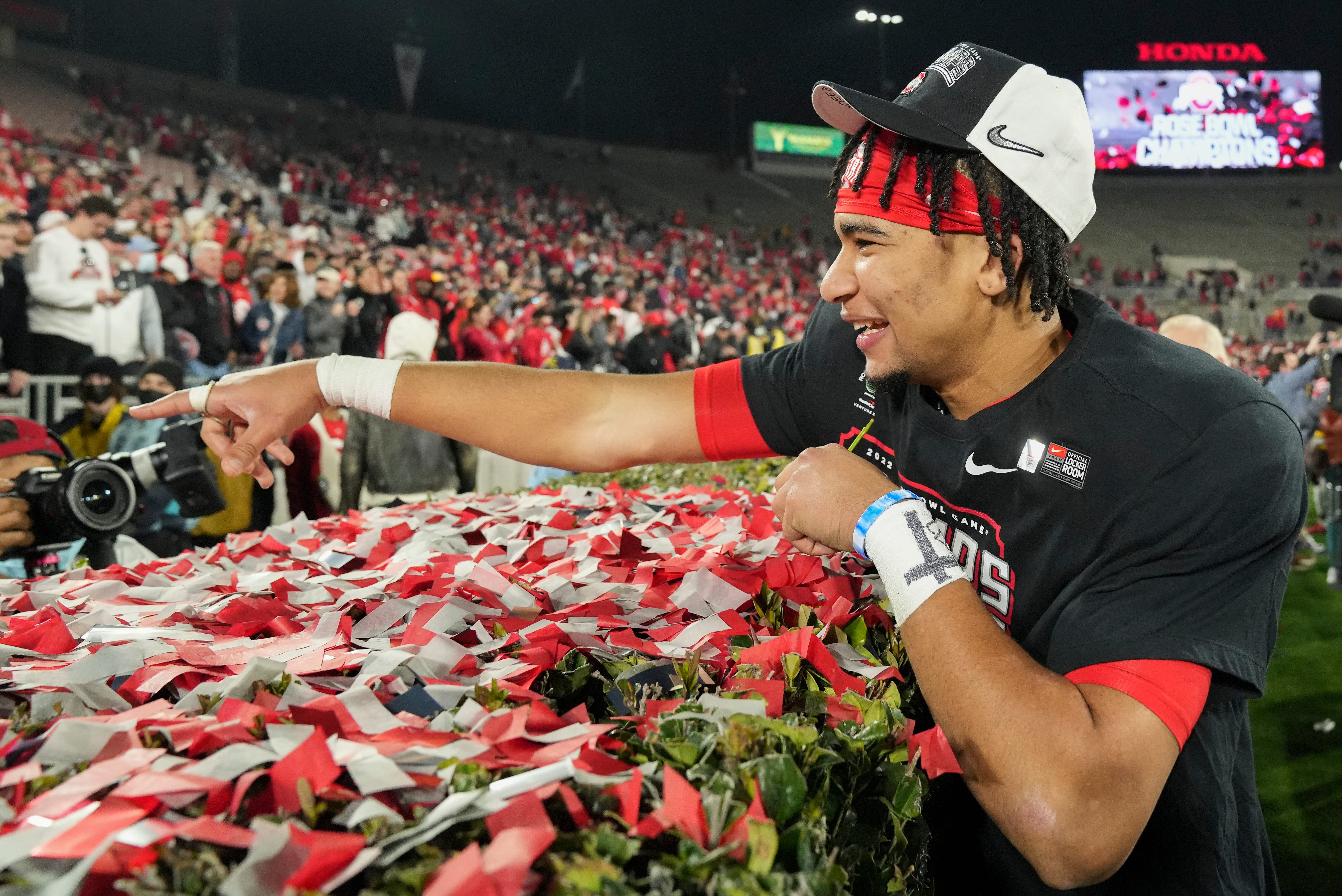 Sat., Jan. 1, 2022; Pasadena, California, USA; Ohio State Buckeyes quarterback C.J. Stroud greets a friend following the Buckeyes’ 48-45 victory against the Utah Utes in the 108th Rose Bowl Game.