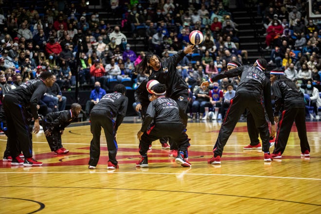 The Harlem Globetrotters dance before the game Thursday, Dec. 30, 2021, at the BMO Harris Bank Center in Rockford.