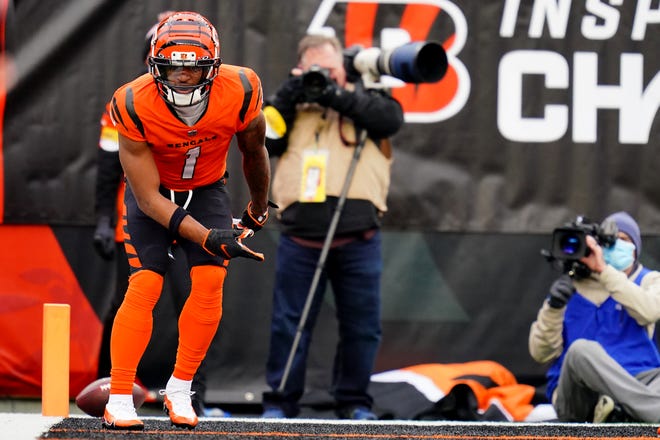 Cincinnati Bengals wide receiver Ja'Marr Chase (1) celebrates a touchdown catch in the second quarter during a Week 17 NFL game against the Kansas City Chiefs, Sunday, Jan. 2, 2022, at Paul Brown Stadium in Cincinnati.