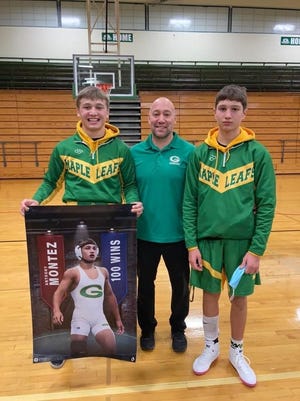 Geneseo High School senior Anthony Montez celebrated his 100th victory at the recent meet with Princeton held in Geneseo. With him are his Dad, Coach Jessie Montez, and his brother, Zachary Montez, a freshman at GHS.